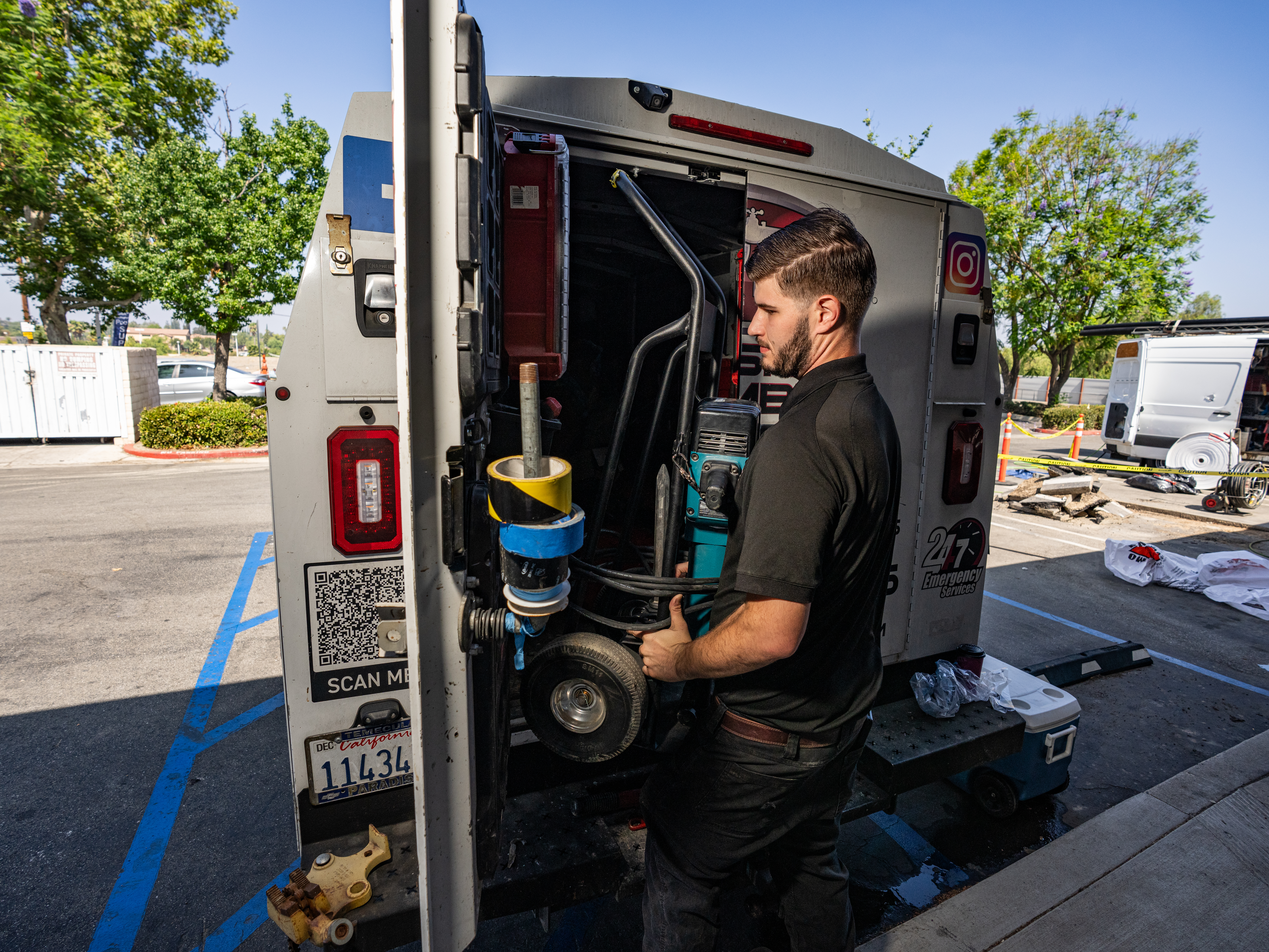 Plumber loading truck